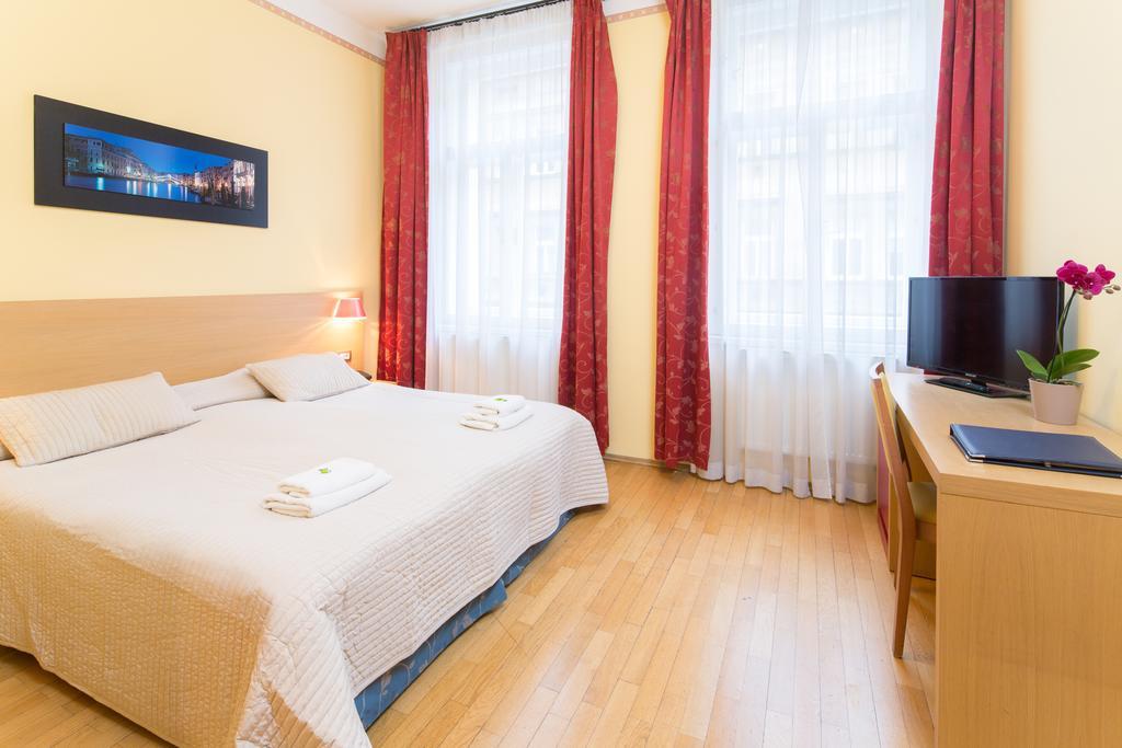 City Lounge Hotel Praga Habitación foto